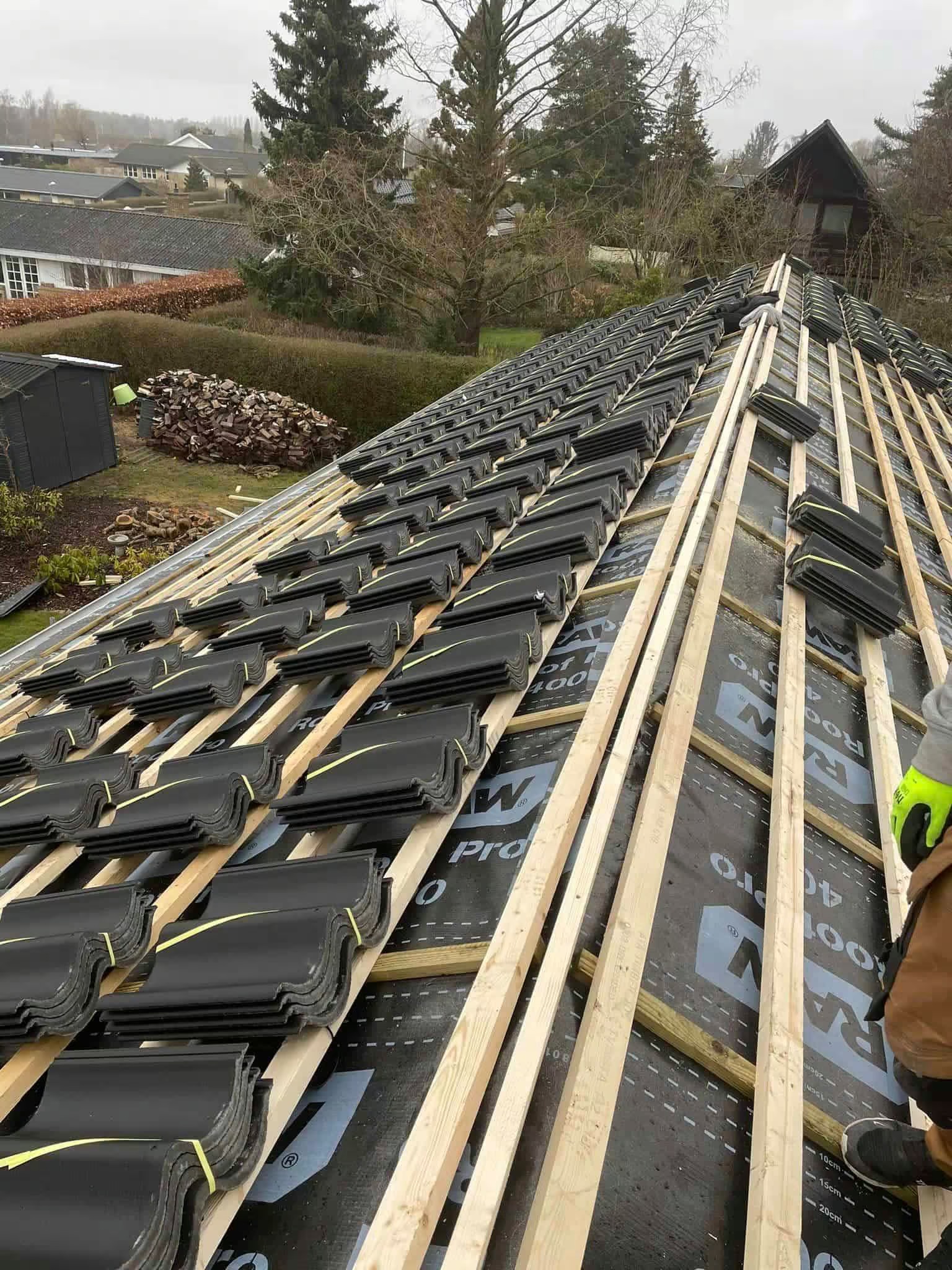 Invester i et nyt tag og øg værdien af din bolig